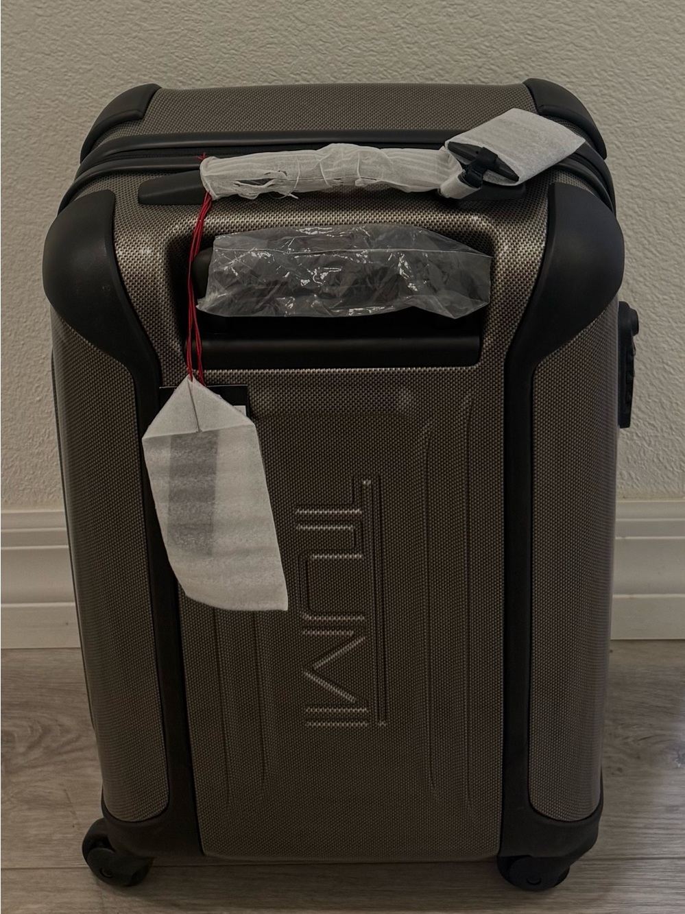 NWT TUMI Vapor International Carry On in bronze/brown with black trim.